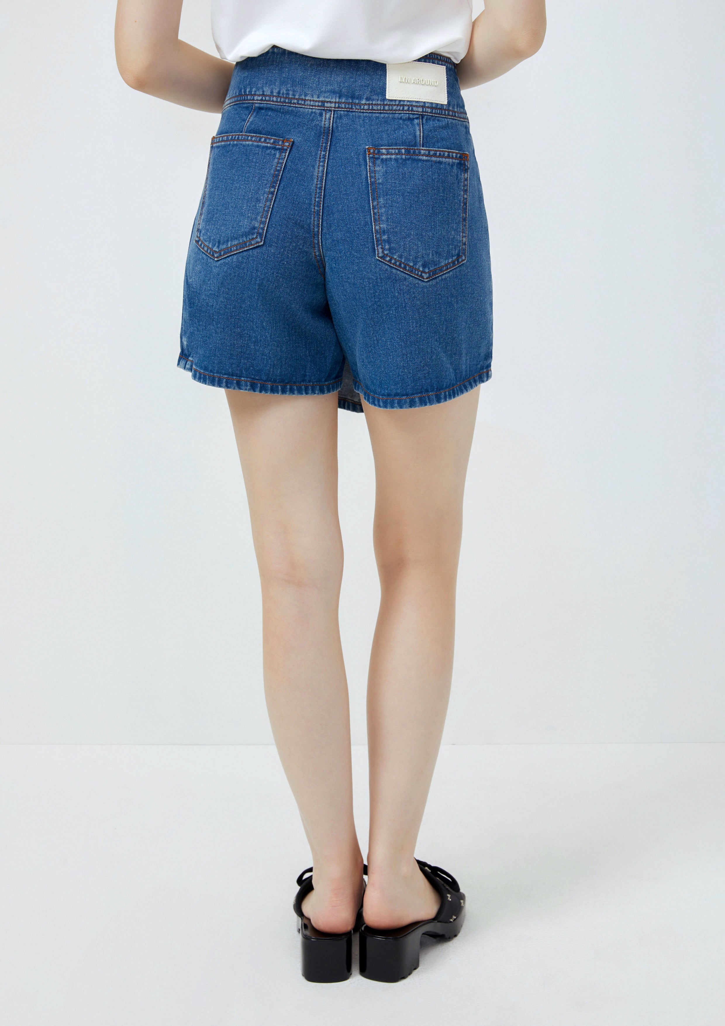 Pleated Denim Skorts Lost In Museum Collection